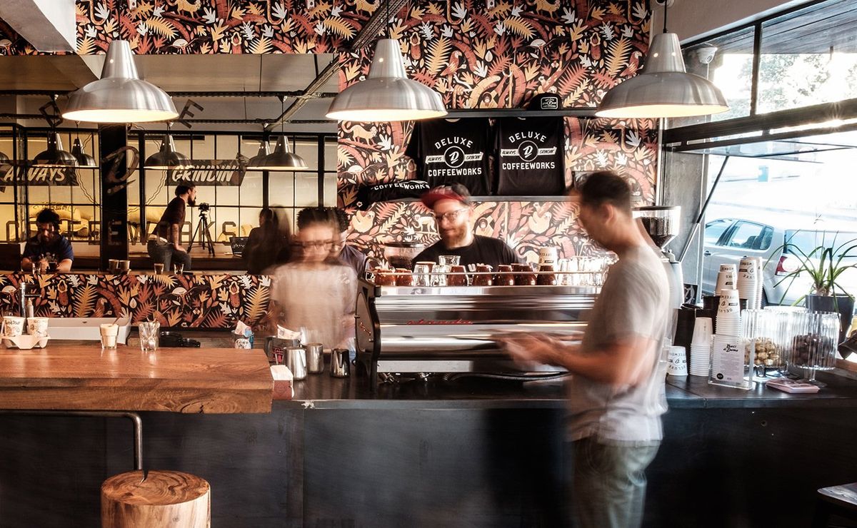Baristas at work in a busy Cape Town coffee shop
