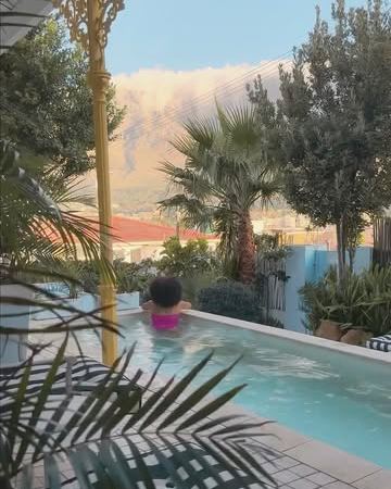 A swim in the pool under Table Mountain, the yellow lace beside it