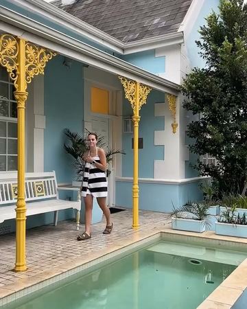 Along the verandah beside the pool