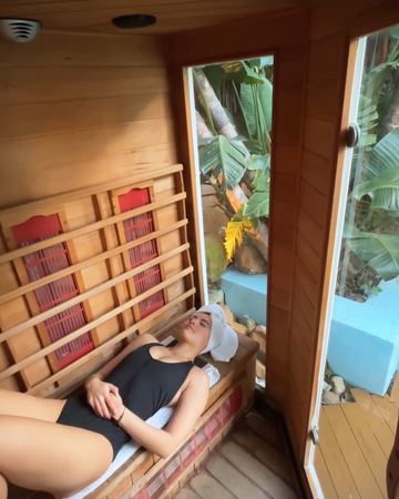 Lying back in the infrared sauna
