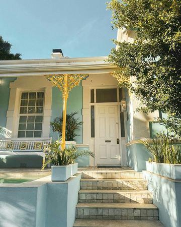 The front door and the steps in full sun