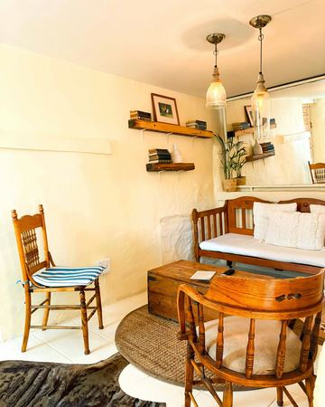 The Bungalow Suite: the living area and the bed